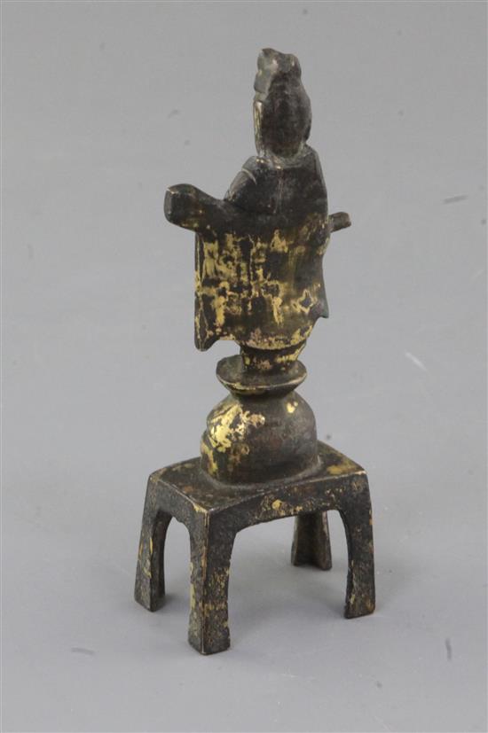 A small Chinese gilt bronze figure of a Daoist deity possibly Yuanshi Tianzun, Tang dynasty (AD 618-907), h. 11cm